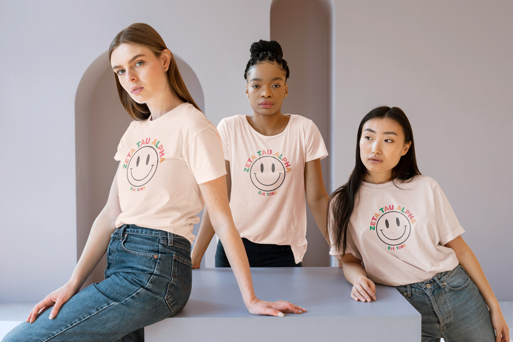 ZTA design on a cream colored shirt